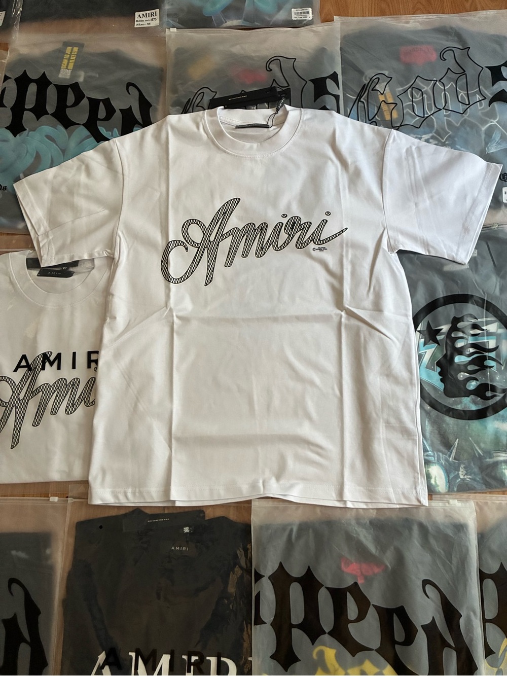 AMIRI White Logo Script Short-Sleeve Tee with Black Outline